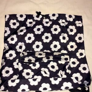 Black and white Daisy backpack.